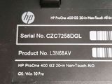 the back side of a hp laptop with the serial number on it