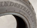 tire tread of a truck with the word industrial written on it