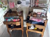 two wooden tables with pictures on them in a room