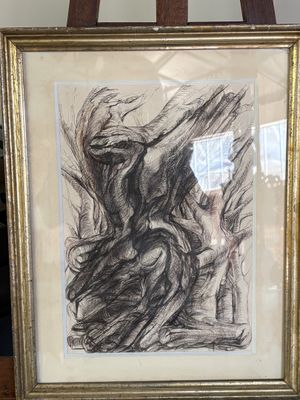 dessin encadré représentant une femme tenant un oiseau dans la main