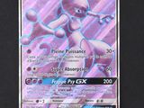 a close up of a pokemon card on a black surface