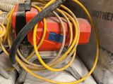 a pile of fire hoses and hoses on the ground