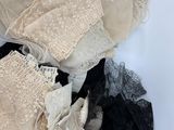 four different types of bras on a white surface