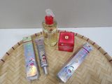 a bottle of lotion and a tube of lotion sitting on a tray