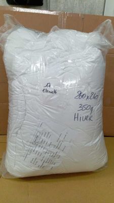 a bag of rice sitting on a table next to a box