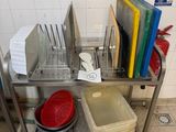 a stainless steel kitchen cart with a bunch of utensils on it