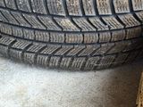two tires that are sitting next to each other on the ground