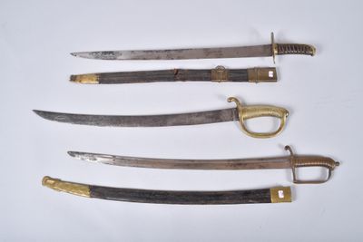 four different types of knives are displayed on a white surface
