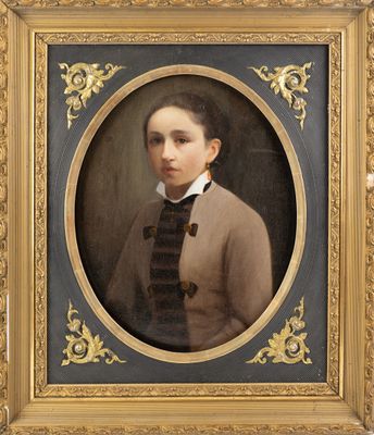 portrait of a young man in a brown jacket and black bow tie
