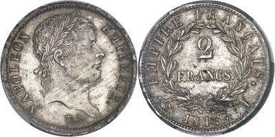 une pièce en argent portant le portrait d'un homme