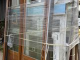 a lot of windows that are wrapped up and ready to be shipped