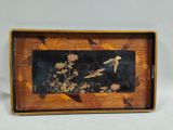 an image of a picture of birds in flight on a wooden tray