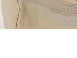 a close up view of a pair of beige shoes