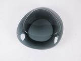 an image of a black glass object on a white surface