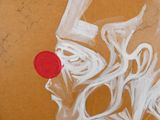 une photo d'une œuvre d'art posée sur une table
