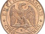 a close up of a coin with an eagle on it
