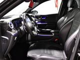 the interior of a car with black leather seats and a steering wheel