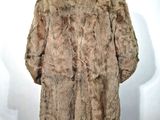 an image of a woman wearing a fur coat