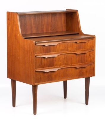 a wooden desk with three drawers and a shelf on top of it