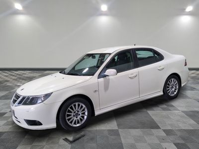a picture of a white car on a checkered floor