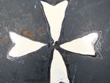 a black helmet with a white cross on it