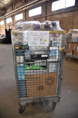 a cart with a lot of items in it in a warehouse