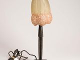 an image of a lamp that is sitting on a table next to a cord