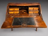an old desk with drawers and a desk top