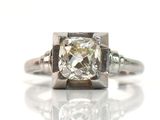 an image of a diamond ring on a white surface