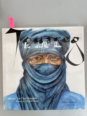 a picture of a book with a picture of a woman wearing a blue hijab