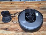 a robot that is sitting on a table next to a mouse