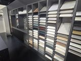 a picture of a room with a lot of different colors of tile