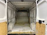 a white van with a wooden floor in the back of it