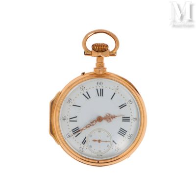 une montre de poche en or avec des chiffres romains sur le cadran