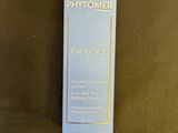 a close up of a bottle of phytomer on a table