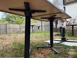 a table that is sitting on the ground in the yard