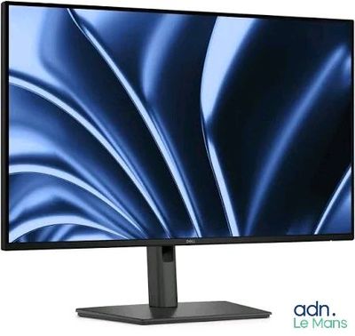 a computer monitor sitting on top of a desk next to a keyboard