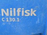 a blue bin with a sign that says nilfisk on it