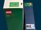 a box of legos sitting next to a box of toothbrushes