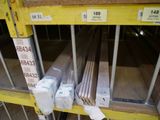 many different types of steel bars on the shelves
