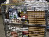 a metal cart filled with boxes of food inside of a warehouse
