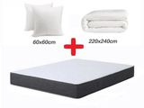 the mattress is made of foam and has two pillows and a pillow