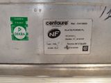 a close up of a metal container with a sticker on it