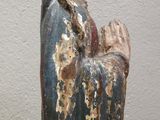 a statue of a woman with a crown on her head