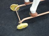a horse that is standing on a skateboard with a banana on it