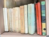a box full of books that are sitting on a table
