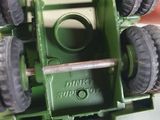 a close up of a toy truck with wheels on it