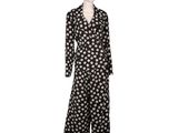 a black and white polka dot print long sleeved jumpsuit