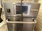 a microwave that is sitting on top of a counter