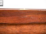 a close up of a piece of wood on a table